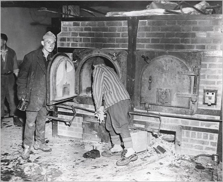 Mauthausen - former prisoners in the Crematorium after liberation